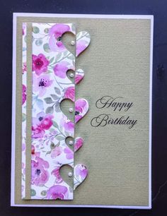 a birthday card with flowers on it