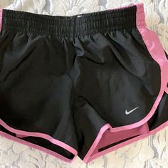 Nwot Size Xs Nike Women’s Black And Purplish Pink Running Shorts With Spandex Shorts Attached Inside. I Love These Shorts. They Are Adorable And So Great, But I Purchase Because They Were On A Mis-Marked Hanger-So They Are Not My Size Tags Were Removed Already. Bundle With Other Closet Items For Added Savings Spandex Shorts, My Size, Shorts Athletic, Pink Shorts, Nike Shorts, Running Shorts, Athletic Shorts, Black Shorts, Black Nikes