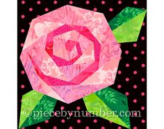 a pink rose with green leaves on a polka doted black background is featured in this quilt pattern