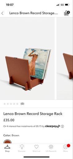 an image of a brown record storage rack on the app store's iphone screen