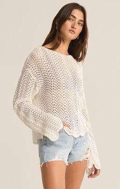 Add a layer of dimension to your wardrobe this season with the Donovan Crochet Top. The relaxed, drop shoulder design is perfect for throwing on over a tank, and we’re loving the scalloped edge with crochet zig zig pattern. It runs a little big in the width, but not the length.