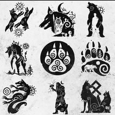 some black and white designs on the side of a wall with an image of animals