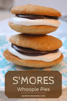 three cookies stacked on top of each other with the words s'mores whoopie pies