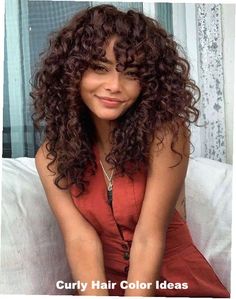 Check out these 25 Vibrant Curly Hair Color Ideas for a Stunning Makeover! From natural curly hair cuts to highlights curly hair, we\'ve got all the inspiration you need. Explore beautiful colored curly hair, from auburn brown hair curly to curly hair chestnut brown. Whether you\'re looking for dyed curly hair or classic brown curly hair, these curly hair photos will inspire your next transformation. Get ready for a bold, beautiful change! Chocolate Brown Hair Color Curly Hair, Curly Medium Length Hair With Bangs, Curly Haircuts Medium Layers, Bangs With Curly Hair Natural Curls, Curly Hair Transition, Curly Hair Cuts For Round Faces, Curly Hair Cuts With Layers And Bangs, Curly Bangstyle Hair, Curly Hair With Curtain Bangs