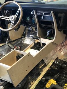 the inside of a car being worked on