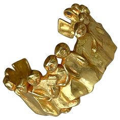 For Sale on 1stDibs - A gilt bronze bracelet by Line Vautrin (1913-1997), circa 1945-46. The design is known as 'La Manif' or 'La Manifestation', which features a chain of arm-linked Sculptural Bracelet, Line Vautrin, French Mid Century Modern, Parisian Art, Bronze Bracelet, Ancient Jewellery, Bronze Bracelets, Fantasy Story, Sense Of Humor