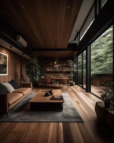 a living room filled with furniture and lots of windows