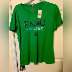 Show Off Your Love For Hbcu Culture With This Famu Culture T-Shirt In Size 2xl. The Vibrant Green Color Is Eye-Catching And Perfect For Any Occasion. Made By Culture Brand, This T-Shirt Is Both Stylish And Comfortable. The Regular Size T-Shirt Is Designed For Women And Is Perfect For All Seasons. Wear It With Jeans, Shorts Or A Skirt And Create Your Own Unique Style. This T-Shirt Is A Must-Have For Any Hbcu Culture Enthusiast. Add It To Your Collection Today. Famu Tshirts, Hbcu Culture, Acdc Tee, Friends Tee, Scoop Neck Tee, Pink Tee, Vibrant Green, Soft Shorts, Striped Linen