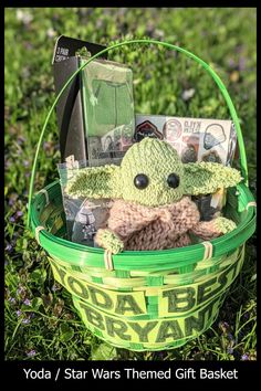 yoda / star wars themed gift basket with money in it on the grass outside