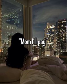 a woman laying in bed with the words mom i'll pay