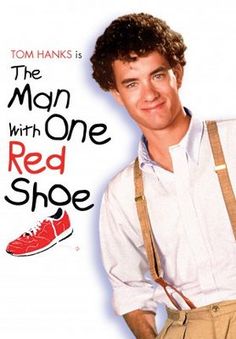 the man with one red shoe is standing in front of a white poster that says, the man with one red shoe