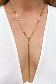 Crystal Y-Necklace, Y Crystal Lariat, Crystal Lariat, Lariat gold, gold crystal necklace, teardrop crystal necklace, peridot necklace Measurements: The necklace is 60cm long. The part around the neck measures 48cm, the hanging part 12cm. 🌊 100% waterproof, hypoallergenic and long lasting ✨ Our jewelry is crafted from high-quality stainless steel and plated with 18k gold. 💌 FREE WORLDWIDE SHIPPING Ready to ship in 1-3 business days How long until your jewelry arrives? 2-7 business days: EU 5-12 Green Lariat Jewelry With Adjustable Chain, Green Lariat Necklace For Gift, Teardrop Lariat Necklace For Party, Gold Crystal Necklace, Necklace Measurements, Peridot Necklace, Gold Crystal, Gold Gold, Crystal Necklace