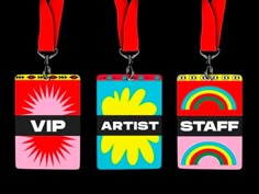 three different colored tags with the words, artist staff and rainbows in black background