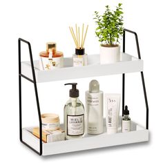 the three tiered shelf has various items on it