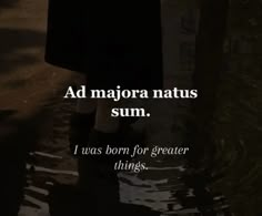 a person walking in the rain with an umbrella over their head that says ad majorora nattus sum, i was born for greater things