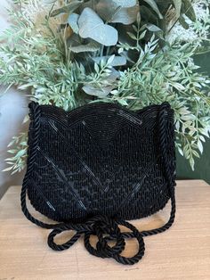 Simple and elegant beaded purse, perfect for engagement party or after the wedding. 7x6 inches Black Beaded Evening Bag For Wedding, Glamorous Beaded Evening Bag, Glamorous Beaded Evening Clutch, Elegant Beaded Clutch Evening Bag, Glamorous Beaded Clutch Evening Bag, Elegant Beaded Clutch For Events, Elegant Beaded Formal Bags, Elegant Beaded Shoulder Bag For Events, Elegant Beaded Rectangular Evening Bag