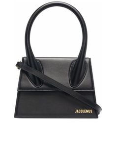 * Colour: Black
   
 * Composition: Calf Leather 100%
   
   
   
 * Year: 2024
   
   
   
 * Made in: Italy
   
   
   
 * Style ID: 213BA0033000990
   
   
   
 * Measurements:
   Width: 23.8cm x Height: 17cm x Depth: 9.5cm
   Handle drop: 14cm
   Strap length: 49cm
   
   
   

Indulge in the epitome of contemporary elegance with the Le Grand Chiquito tote
bag. Boasting a sleek black leather finish with gold-tone letterings, this bag
is a statement of luxury. Its structured design highlights Le Grand Chiquito, Jacquemus Bags, Jacquemus Bag, Black Leather Top, Uniqlo Bags, Italy Style, Leather Shoulder Handbags, Top Handle Handbags, Handbag For Women