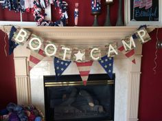 a fire place with a sign that says boot camp hanging from the mantel above it