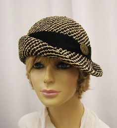 This couture cloche was handmade on an antique hat block using a natural seagrass straw. This hat can be worn in a variety of ways, and is embellished with a black grosgrain ribbon and a vintage button. Please indicate your head size measurement when ordering (measure your head horizontally just above your eyebrows). When you receive your hat, there will be a small ribbon inside to fine-tune the fit, and a hat box for safe storage. I personally create each hat one at a time when I receive your o Statement Hat, Custom Made Hats, Womens Straw Hats, Kinds Of Hats, Hat Blocks, Antique Hats, Unique Hats, The Villages, Millinery Hats