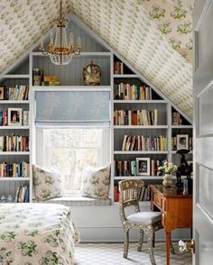 an image of a bedroom with bookshelves in it