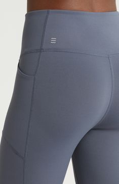 These performance leggings feature a high waist for smoothing coverage and two side patch pockets to keep your essentials secure through your activities. Pull-on style Front patch pockets UPF 50+ sun protection 80% nylon, 20% polyester Machine wash, line dry Imported Stretch Activewear With Functional Pockets For Outdoor Activities, Stretch Activewear With Side Pockets For Outdoor, Solid Stretch Activewear With Upf 50+, Midweight Workout Bottoms With Functional Pockets, Functional Gray Activewear In Recycled Polyester, Midweight Athleisure Bottoms With Functional Pockets, Sporty Compressive Bottoms With Hip Pockets, Functional Outdoor Activewear With Side Pockets, Functional Midweight Moisture-wicking Yoga Pants