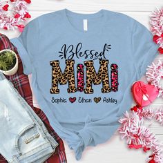 a blue t - shirt with leopard print and the words, blessed mom on it