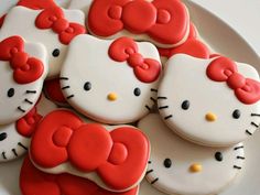 hello kitty cookies are arranged on a plate