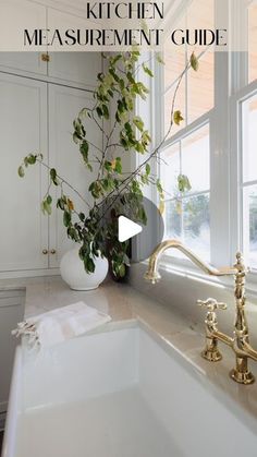 the kitchen measurement guide is displayed in front of a white sink with gold faucets