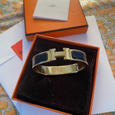 Real Hermes Clic H Bracelet (Black And Gold) Worn 2x, Excellent Condition, Essentially Brand New! Picture Of Receipt (Was A Graduation Gift And Just Don’t Have Any Occasions To Wear It Anymore)