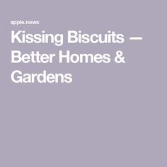 the words kissing biscuits, better homes and gardens are in white letters on a gray background