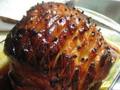 a large piece of meat sitting on top of a pan