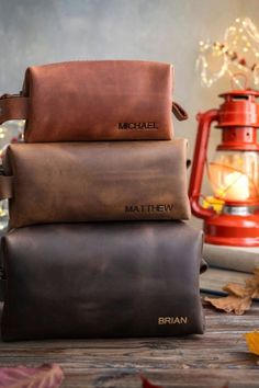 We can guarantee a timely arrival if you send a message with the deadline prior to ordering this leather dopp kit, made to order and personalized. Our toiletry bag would be an awesome choice for your groomsmen gifts and excellent anniversary gifts option Personalized Toiletry Bag, Leather Dopp Kit, Mens Toiletry Bag, Leather Toiletry Bag, Gifts Anniversary, Groomsmen Gifts, Personalised Gifts For Him, Dopp Kit, Travel Case