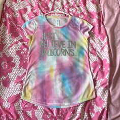 New Condition. Never Worn. Sparkly. Soft. Comfortable. Stylish. Trendy. Tie Dye. Playful Pink Tops With Rainbow Print, Fun Multicolor Tops With Unicorn Print, Casual Multicolor Unicorn Print T-shirt, Cute Multicolor Unicorn Print T-shirt, Fun Multicolor Casual Tops, Fun Multicolor Tops For Sleepover, Fun Multicolor Unicorn Print Tops, Casual Multicolor Unicorn Print Top, Multicolor Cotton T-shirt With Unicorn Print