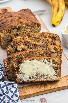 sliced loaf of banana bread with butter on top