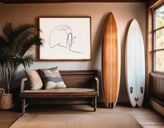 a living room with two surfboards and a couch