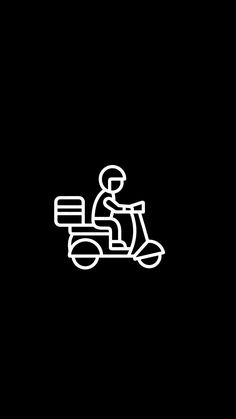 a person on a motor scooter in the dark