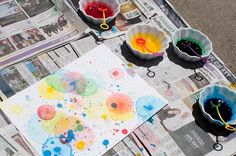 an article about how to make art with watercolors and ink on newspaper paper