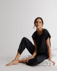 Find yourself craving your linen bedding when you're away? Now you can drape yourself in linen PJs wherever you lay your head. Dolman sleeved with a relaxed fit, and deliberately rumpled look. Elastic waist and side pocketed pants. Our breathable, light, linen collection is made from 100% European flax linen—an eco-friendly, and resource light material.  | Quince | Women's 100% European Linen Pajama Set in Black, Size XL Linen Pjs, Linen Pajama Set, Linen Pajamas, Boyfriend Cardigan, Natural Textiles, Lightweight Pants, Wide Leg Linen Pants, Fabric Structure, European Linens