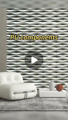 a white couch sitting next to a table with vases on it and a sign that says pu compoments