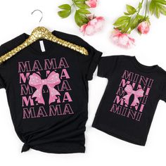 Get ready to elevate your mommy-and-me style with these adorable matching jersey short sleeve tees! 🌸 Made from 100% Airlume combed and ringspun cotton, these tees offer ultimate comfort for both mom and daughter. It's like wearing a warm hug from each other all day long! ✨ The quality print on each tee adds a touch of charm to your twinning attire. With ribbed knit collars, these tees offer a perfect fit for both of you while maintaining their shape over countless washes and wears. 👚 Crafted Cute Family Shirt With Letter Print, Family Matching Pink T-shirt With Letter Print, Pink Family Matching T-shirt With Letter Print, Funny Print Short Sleeve Shirt For Mother's Day, Matching Cotton T-shirt For Mother's Day, Pink Matching Tops For Mother's Day, Pink Short Sleeve Family Matching Shirt, Black Family Matching Shirt For Mother's Day, Matching Short Sleeve T-shirt For Birthday