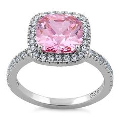 Top of ring height: 12.2mm

Top of ring width: 12.3mm

Band width: 2mm

Shank width: 2mm



Stone material: pink & clear cubic zirconia

Center stone size: 9mm

Stone shape: cushion cut

Center stone carat weight: 2.75 ct.

Total number of CZ stones: 61

Stone setting: prong setting



Metal: 925 sterling silver

Plating: rhodium plated

Finish: high polish Silver Cushions, Stone Material, Stone Setting, Cz Ring, Cz Stone, Cushion Cut, Stone Settings, Sterling Ring, Rhodium Plated