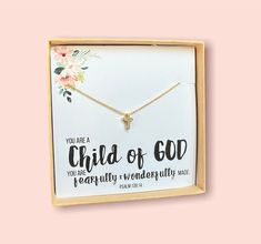 "A beautiful dainty cross necklace for children in gold or silver. Perfect for girls OR boys! This cute cross necklace makes the perfect baptism gift & christening gift! Choose the necklace only, or choose from on of our 8 gift necklace cards & box! We take a gold or silver plated cross pendant and string it from a sparkly diamond-cut chain. Each necklace is handmade one at a time with the utmost love and care in our NC, USA studio. D E T A I L S: - Baptism Gift, Christening Gift, Encouragement Cross Necklace For Mother's Day, Cute Cross Necklace, Necklace Cards, Dainty Cross Necklace, Cute Cross, First Communion Gifts, Faith Gifts, Communion Gifts, Encouragement Gifts