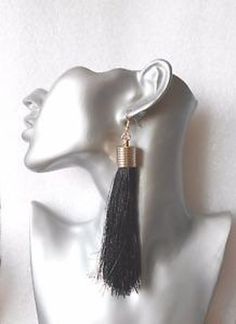 These earrings are created with luxuriantly thick tassels.  They measure 5" long.  All my earrings are available in pierced and clip-on format. Chic Evening Earrings With Tassels, Dangle Tassel Earrings For Evening, Long Drop Fringe Tassel Earrings, Long Tassel Earrings, Tassel Earrings, Jewelry Earrings Dangle, Etsy Earrings, Tassels, Dangle Drop Earrings