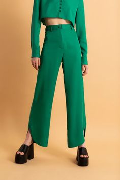 Shop the classic Gina High Waisted Pant in Emerald Green from Santos by Monica. Made from 100% TENCEL Apparel, these pants are lightweight and sustainable. Perfect for summer! Chic High-waisted Wide Leg Pants With Side Slits, Casual High-waisted Pants With Side Slits For Workwear, Casual High-waisted Bottoms With Side Slits For Work, High-waisted Pants With Side Slits For Workwear, High-waisted Workwear Bottoms With Side Slits, Workwear Trousers With Side Slits, Wide-leg Workwear Pants With Side Slits, Wide Leg Workwear Pants With Side Slits, Wide Leg Pants With Side Slits For Workwear