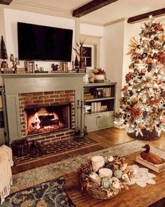 a living room with a christmas tree and fireplace