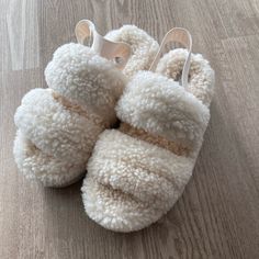 Ugg Fluffy Sandals, Size 9. Soft And Comfortable. Brand New. White Fluffy Slippers With Round Toe, Cream Flat Slippers With Cushioned Footbed, Comfortable Cream Open Toe Slippers, Ugg Flip Flops, Fluffy Sandals, Ivory Sandals, Ugg Sandals, Chestnut Boots, Fur Sandals