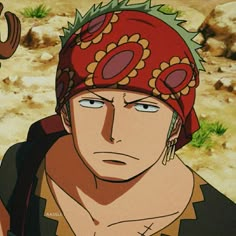 an anime character wearing a red bandana