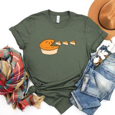 Pumpkin Pies Shirt, Pumpkin Lover Shirt, Pacman Thanksgiving Shirt, Funny Thanksgiving Shirt, Thanksgiving 2023,Friendsgiving Party Shirt Happy THANKSGIVING to all  This t-shirt is great for all things from Fall, Halloween  to Thanksgiving and all special events in it. Match this shirt with a cozy denim jacket or your favorite jeans and you're ready for  all funny Fall, Halloween Spooky season and Thanksgiving   activities. It will become your new favorite shirt and helps you keep your Thankful vibes. 👉HOW TO ORDER👈 1️⃣ Please review all the information provided before placing an order 2️⃣ Select the shirt type and size using the drop down menu. 3️⃣ Select the color of the shirt using the following drop down menu. 4️⃣ Need more Items? Add the current item in the cart. And If you like to Casual Crew Neck Tops For Thanksgiving, Thanksgiving 2023, Friendsgiving Party, Funny Fall, Pumpkin Pies, Funny Thanksgiving Shirts, Thanksgiving Activities, Thanksgiving Shirt, Funny Thanksgiving