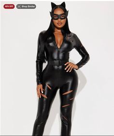 a woman in black catsuits posing for the camera with her hands on her hips