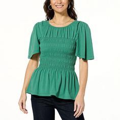 DG2 by Diane Gilman Smocked Bodice Flutter-Sleeve Top  A playfully flouncy silhouette with short flutter sleeves and a flared peplum hem, this smocked top is ready to take you places! Flaring to the hips in a flattering silhouette, this feminine frock pairs easily with the bottoms of your choosing. Spring Casual Smocked Top With Flutter Sleeves, Solid Color Tops With Smocked Bodice And Short Sleeves, Casual Smocked Top With Flutter Sleeves For Spring, Casual Smocked Top With Flutter Sleeves, Green Ruched Short Sleeve Tops, Summer Ruffle Sleeve Top With Elastic Sleeves, Summer Tops With Ruffle Elastic Sleeves, Spring Short Sleeve Smocked Stretch Top, Spring Stretch Smocked Top With Short Sleeves